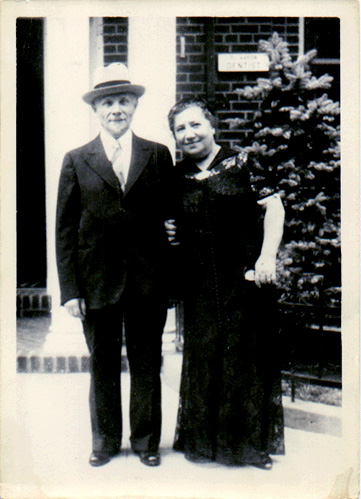 Julius & Bella Moroch in front of a dentist's office