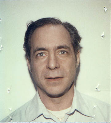 Passport photo or mug shot?